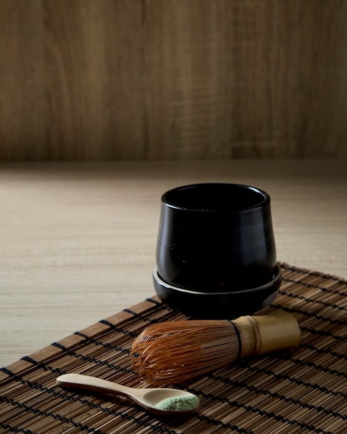 A photo showcasing a Japanese tea ceremony, emphasizing the serene atmosphere and the meticulous preparation and serving of the tea, highlighting the concept of Omotenashi.