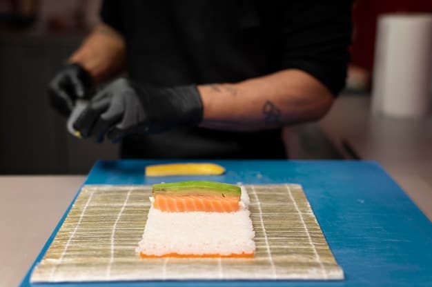 Close-up shot of a chef meticulously preparing nigiri sushi at a high-end sushi restaurant in Tokyo. The focus is on the chef's skilled hands and the fresh, high-quality ingredients, like tuna and salmon.
