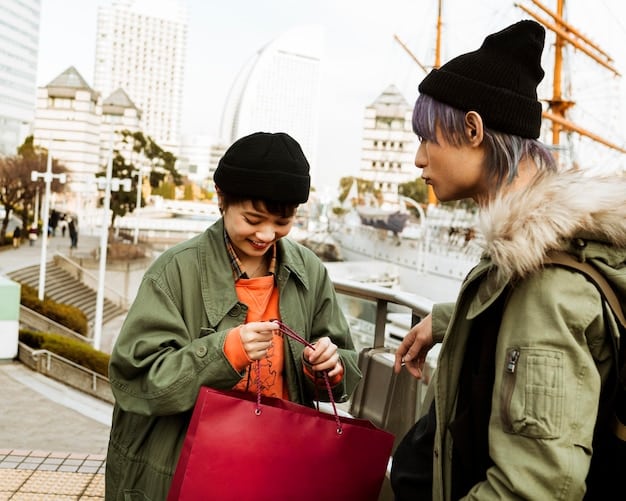 A Japanese cashier handing a sealed duty-free bag with purchased goods to a US tourist, with the store's tax-free sign visible in the background.