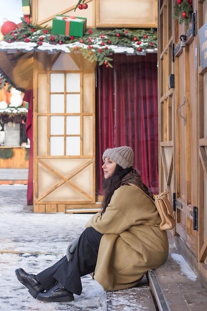 A US traveler bowing slightly as they enter a small, traditional crafts shop in Kyoto. The shop owner is returning the bow with a warm smile.