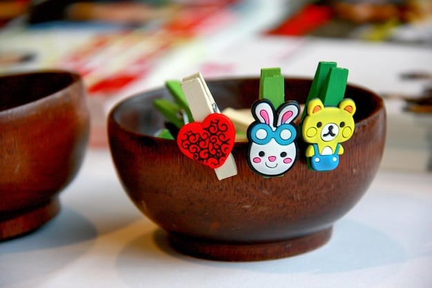 A close-up photograph of a variety of small, colorful Japanese souvenir items, such as keychains, small figurines, and wrapped candies, spread out on a table.
