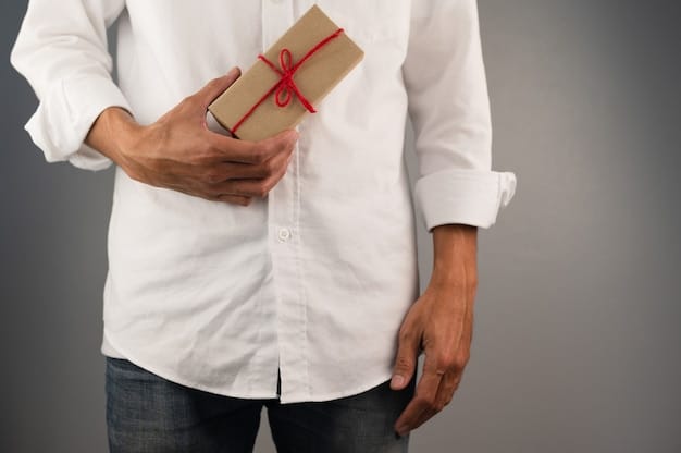 A close-up shot of hands exchanging a gift wrapped in elegant Japanese paper, highlighting the respectful and deliberate manner in which gifts are presented.