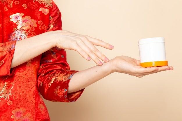 A medium shot of a hand holding a Japanese cosmetic product, with a clear focus on the product label that displays both Japanese characters and international symbols such as the recycling symbol and the e-mark. The packaging also features English translations for some of the key information.