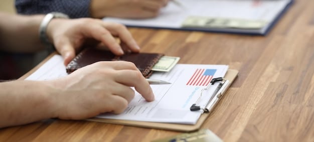 A Japanese retail worker attaching a tax exemption form to a US traveler's passport after a purchase