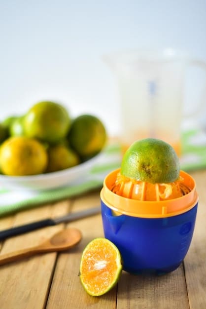 A photograph showcasing a vibrant green yuzu fruit cut in half, next to a jar of bright orange yuzu kosho paste, with a blurred background of a lush yuzu orchard.