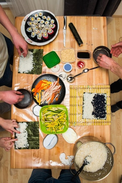 A well-lit, overhead shot of a kitchen counter filled with various colorful ingredients for onigiri fillings. There are bowls of cooked salmon, sliced avocado, kimchi, cooked shrimp, and roasted vegetables, along with containers of furikake and jars of pickled plums, all arranged neatly to inspire creativity in onigiri making.