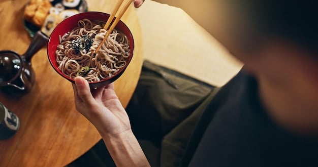 A person enjoying a bowl of ramen noodles, with chopsticks lifting the noodles and a slight slurping sound effect subtly indicated. The image captures the casual and enjoyable experience of eating noodles.