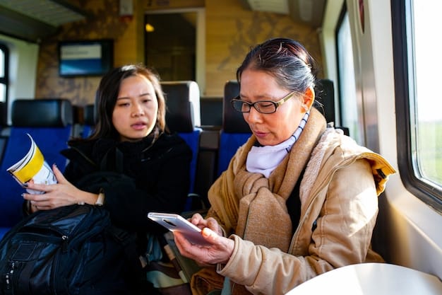A Japanese commuter politely offering their seat to an elderly woman on a train. The woman is gratefully accepting the offer.