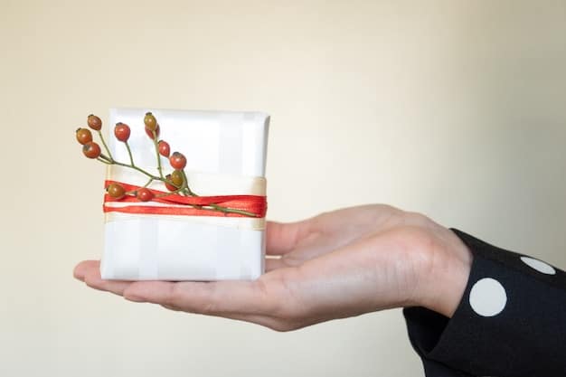 A beautifully wrapped box of omiyage (souvenir/gift) being presented with both hands, showcasing the Japanese custom of gift-giving.