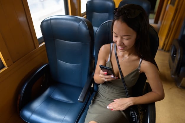 A picture of priority seating on a Japanese train. The seats are clearly marked with signs indicating they are for elderly, disabled, pregnant women, and people with babies.