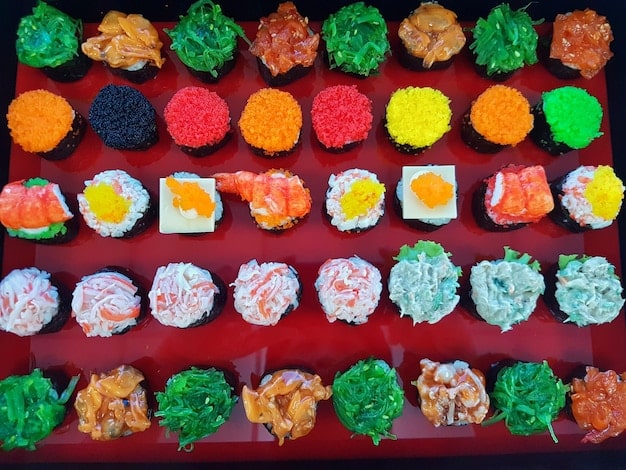 A close-up shot of a variety of colorful and diverse onigiri and bento boxes artfully arranged on a shelf inside a brightly lit Japanese convenience store, inviting US travelers to a gourmet experience.