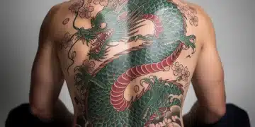 Intricate Japanese Irezumi dragon and cherry blossom back tattoo